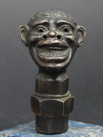 En vente :  OLEO BOUGIE MASCOTTE AUTOMOBILE TETE AFRICAIN